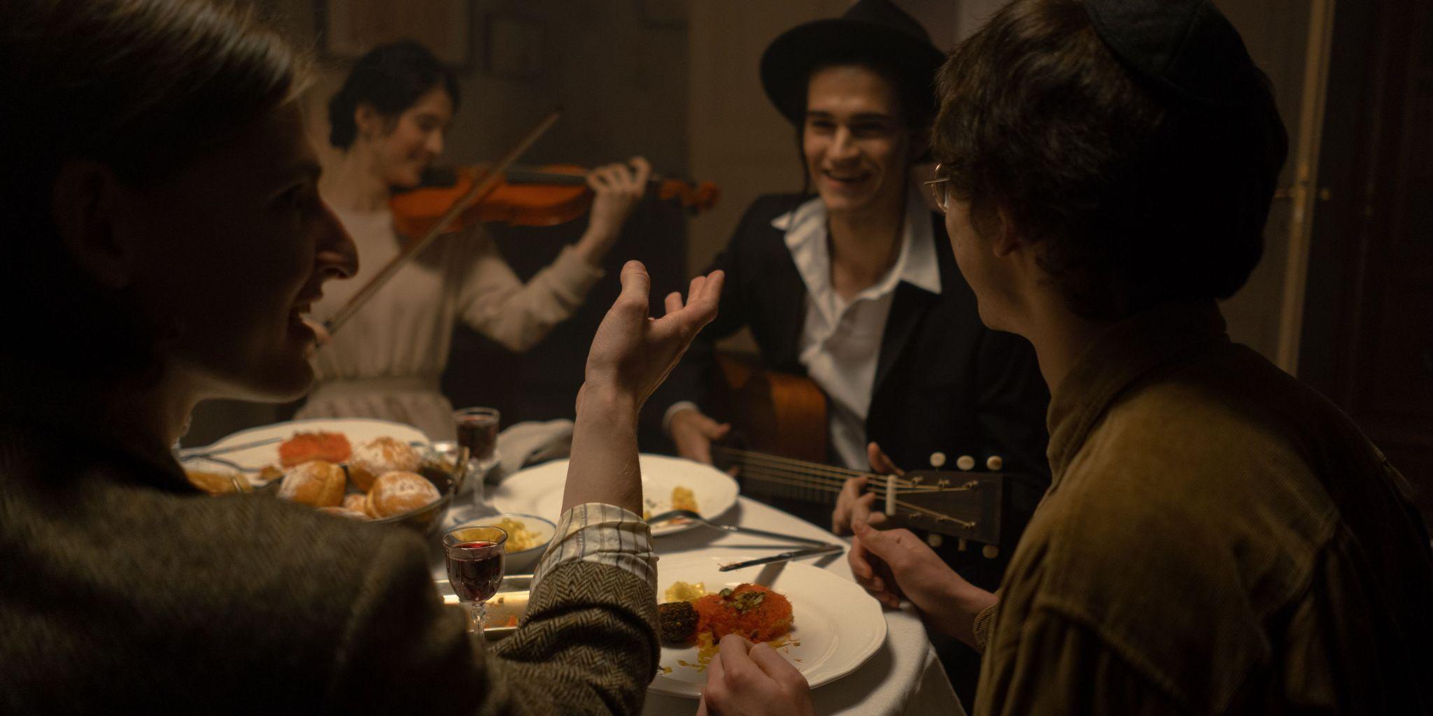 Jewish family taking the food together